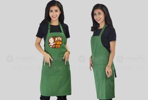 May và in tạp dề màu xanh lá Quán Xôi tiền tỷ