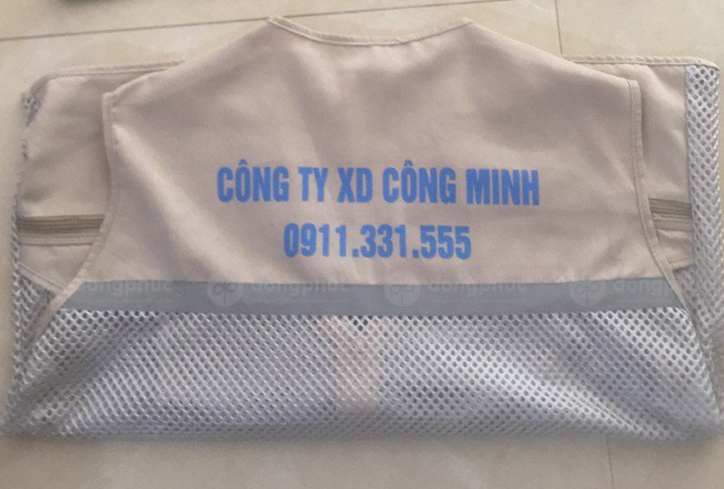 May và in áo gile màu kem Công ty XD Công Minh