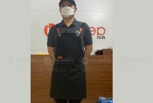 May và in tạp dề màu đen phối cam